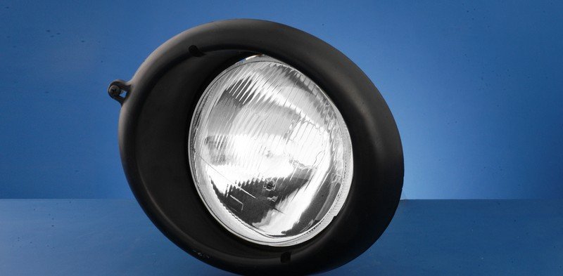 Optica con luz de posicion y aro plastico MB 1112 / 1114